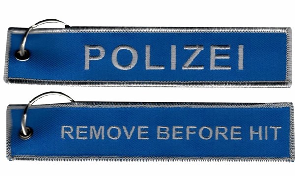 Immagine di Polizei Schlüsselanhänger, Remove before HIT